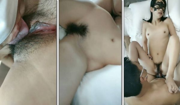 闭着眼睛手抓床单，享受大鸡巴的奋力抽插，两个年轻